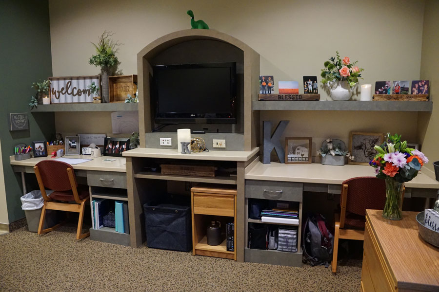 Franklin Hall dorm room with two desks and a TV