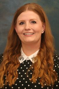 Headshot of Haley Koehn Smiling at Camera