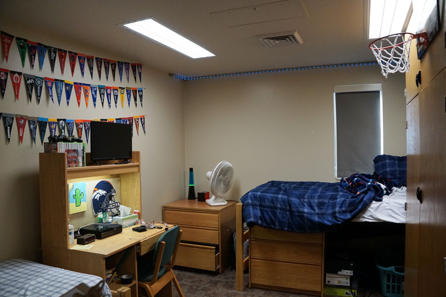 Valley Hall dorm room with desk, dresser and bed