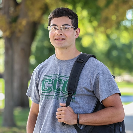 Student walking on CCC campus