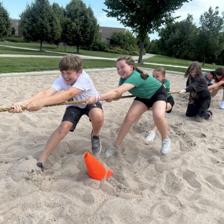 CHI campers playing tug of war.