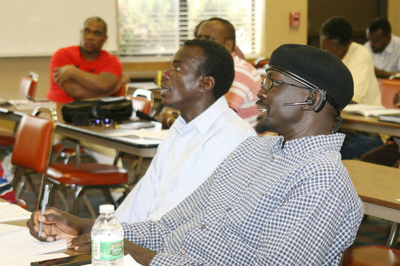 Two students respond to the instructor's question.