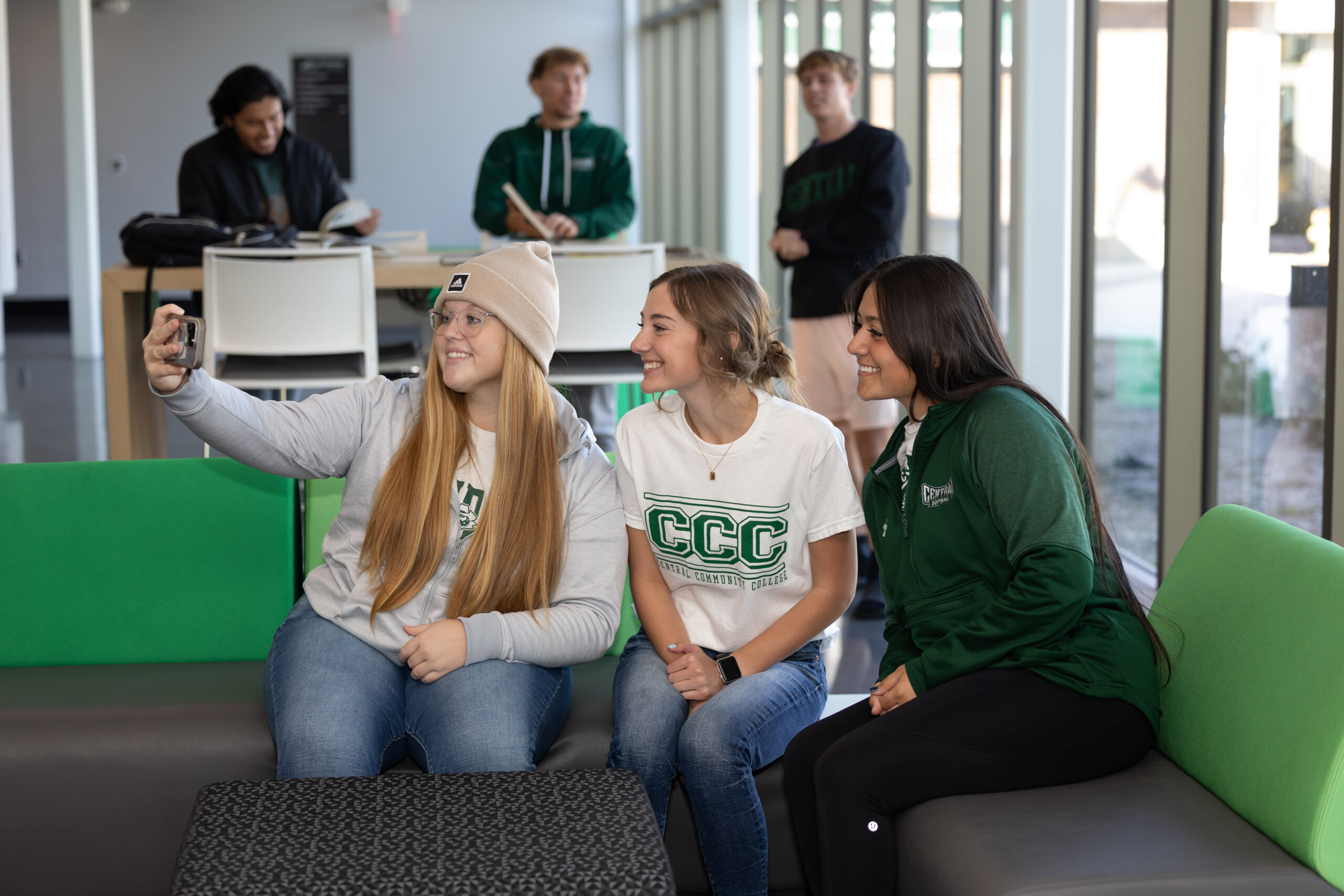 Three students take a selfie on the CCC campus.