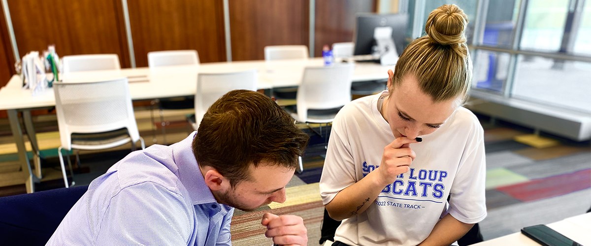 A Tutor and student work together on homework in the Academic Success Center on the Kearney campus.