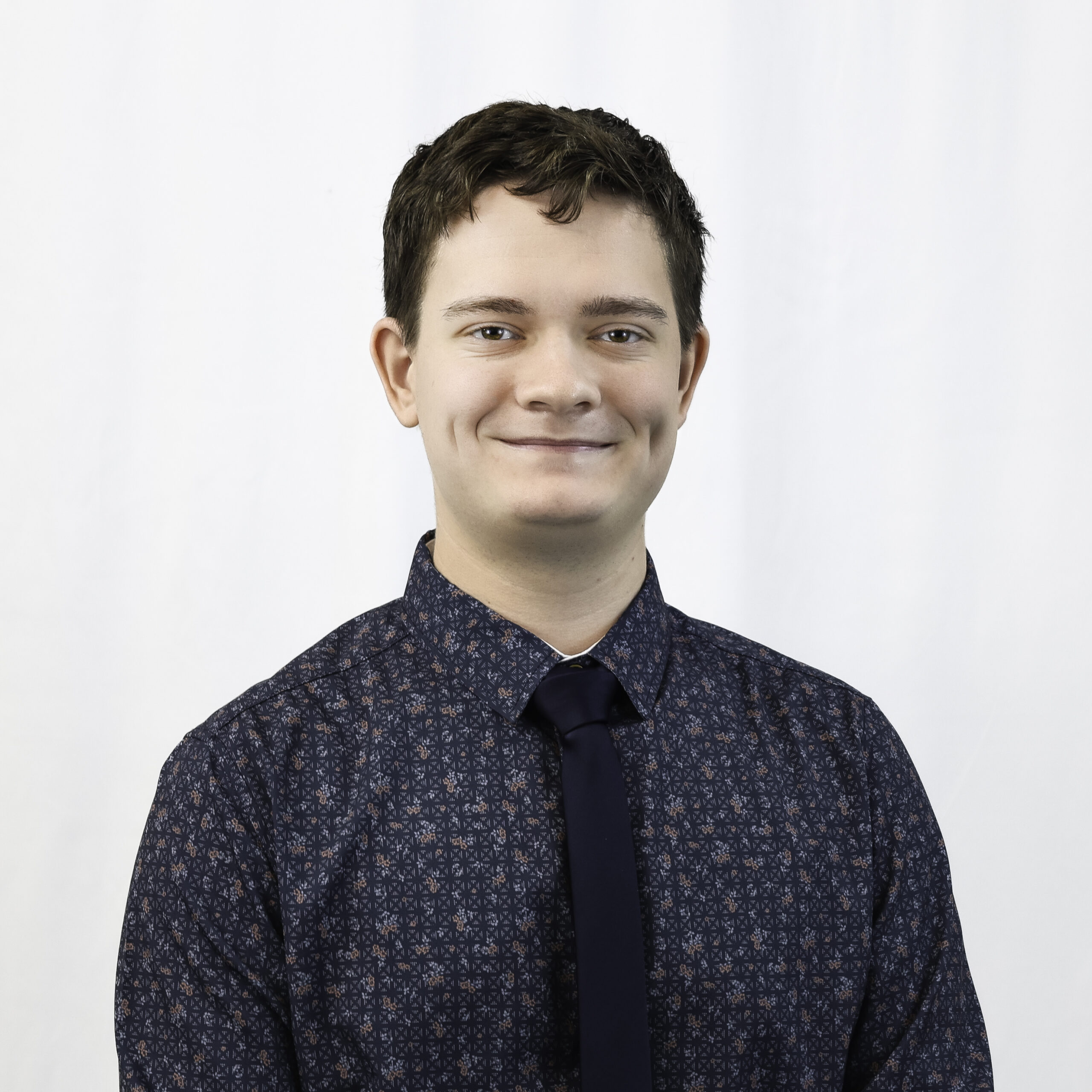 Landon Nelson headshot smiling at the camera