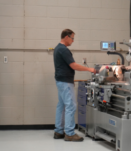 Workshop attendee using machine